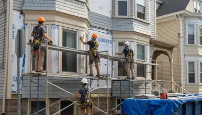 Vinyl siding installation by Medford, MA siding contractors for residential homes